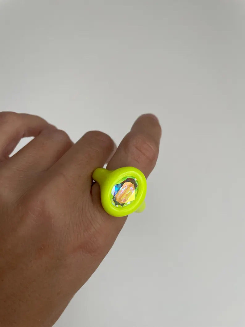 Neon yellow polymer ring with iridescent oval crystal 14mm