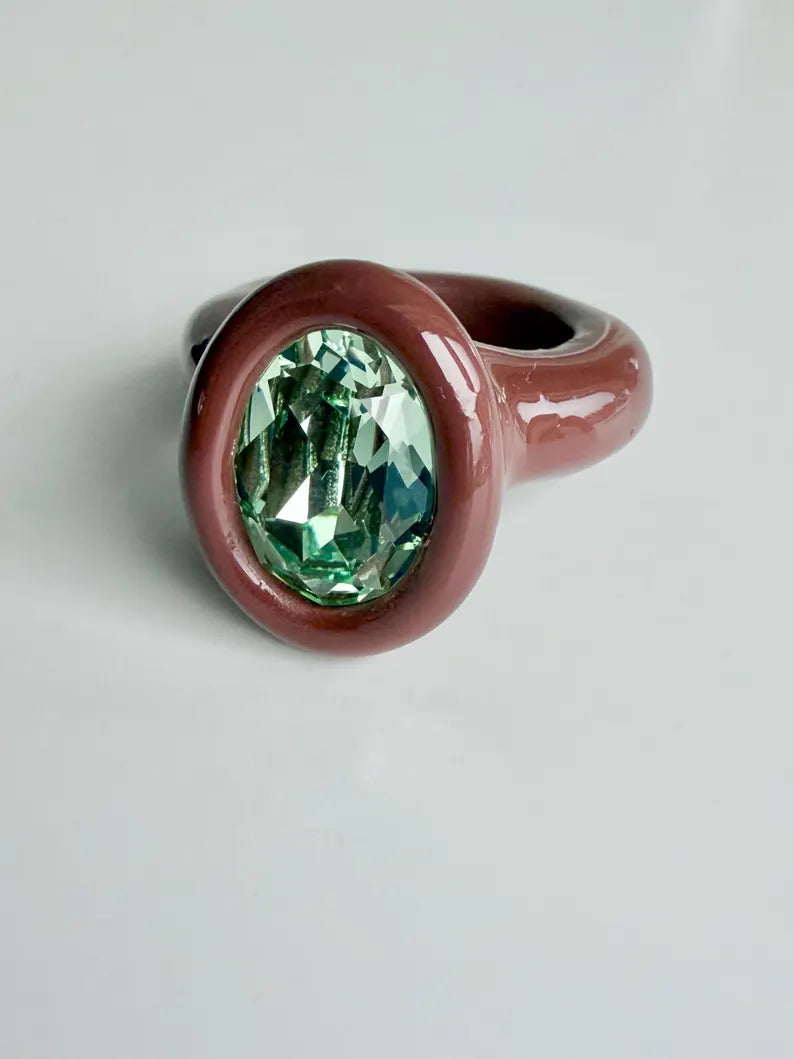 Espresso brown polymer ring with green oval crystal