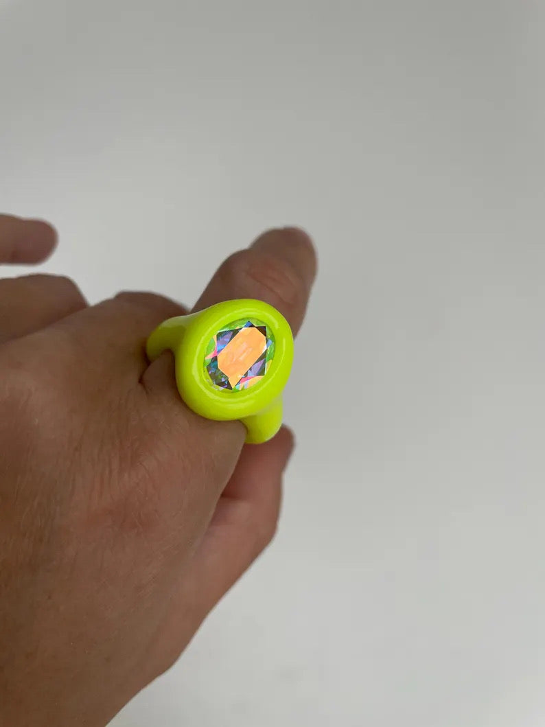 Neon yellow polymer ring with iridescent oval crystal 14mm
