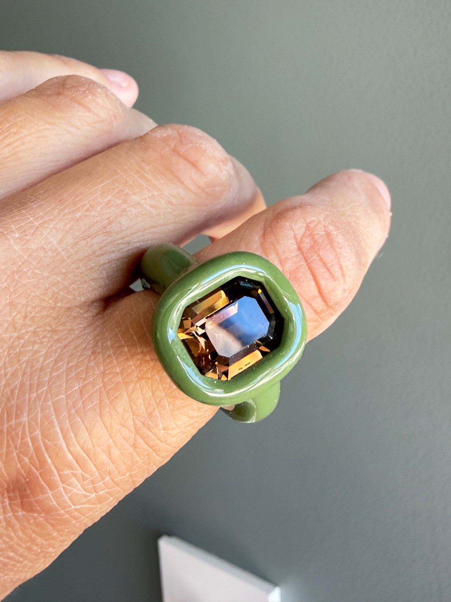 Khakki green pilyner ring with dark brown topaz octagon crystal