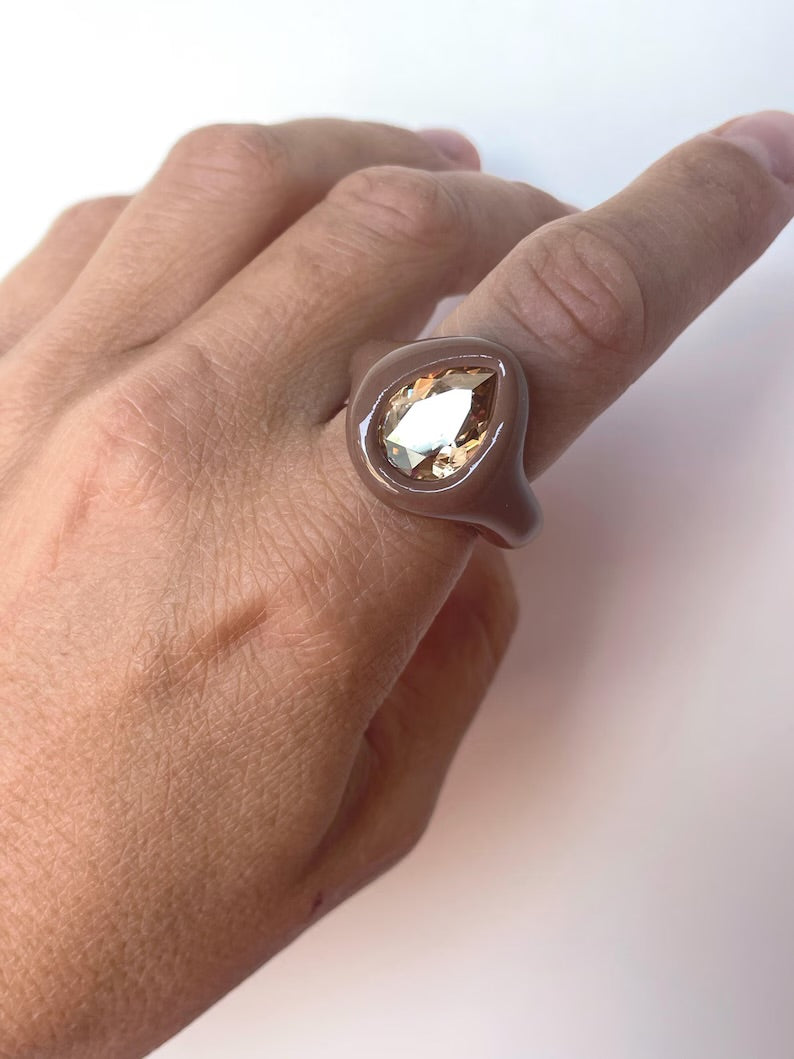 Soft beige ring with golden topaz crystal in pear shape