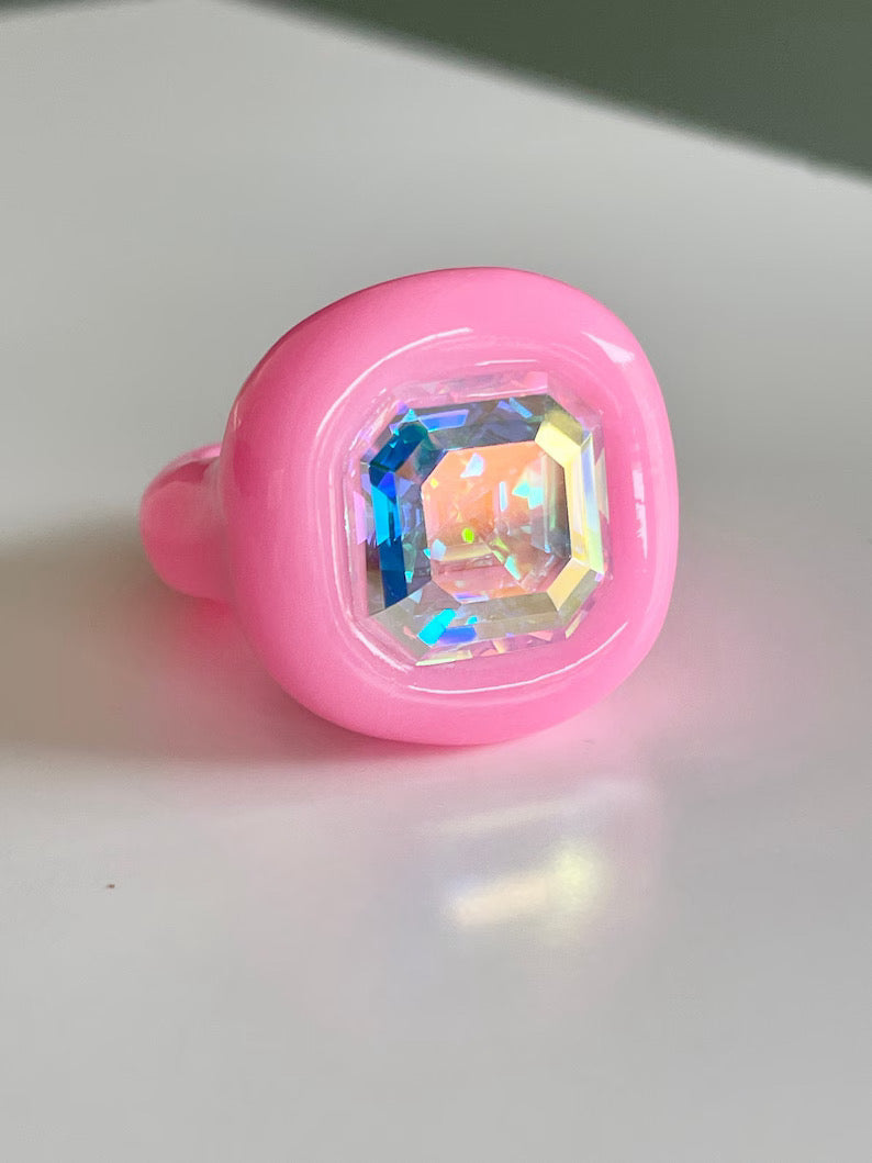 Bubble gum pink polymer ring with 14mm opalescent crystal