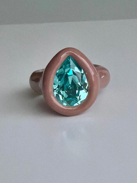 Brown beige ring with paraiba turquoise color pear shape crystal