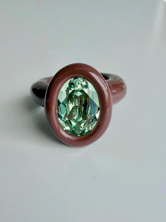 Espresso brown polymer ring with green oval crystal