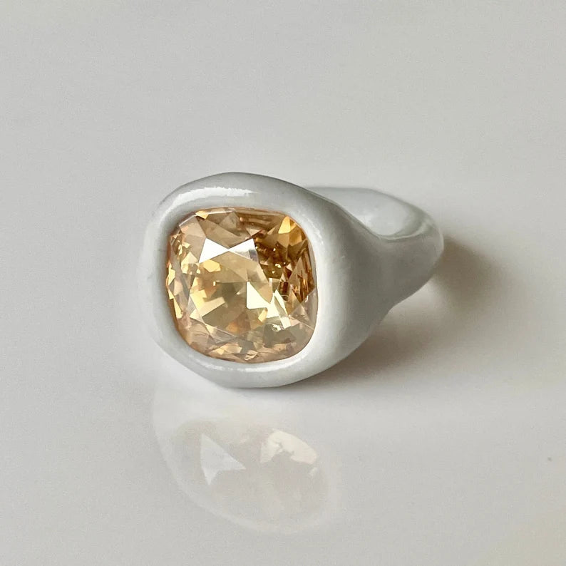 Gray polymer ring with cushion champagne diamond crystal